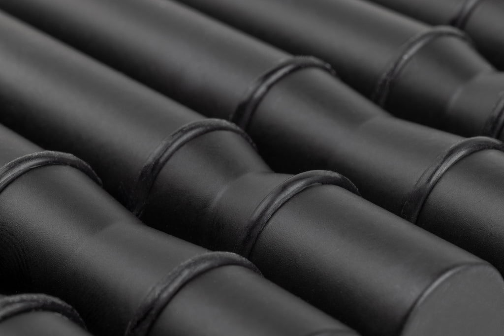 Close-up of Winepegs Nek Rite 1 Lite wall-mounted wine pegs in black finish with silicone o-rings
