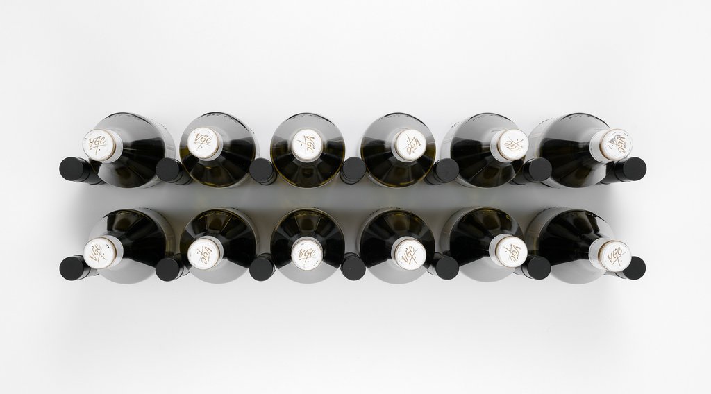 Cork forward Wine Pegs in black finish installed on wall