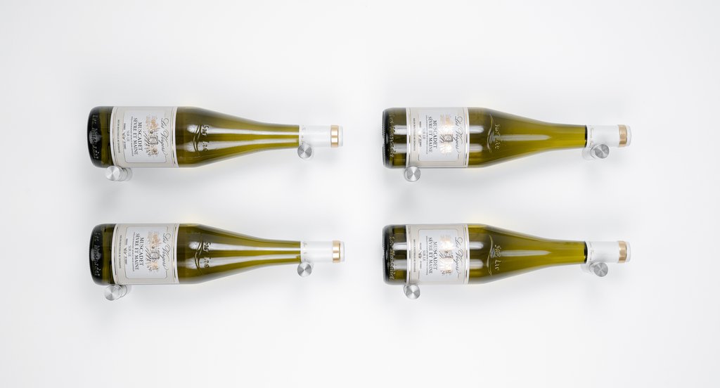 Winepegs Nek Rite 1 Lite wall-mounted wine pegs in brushed aluminum, holding a wine bottle in label-forward display